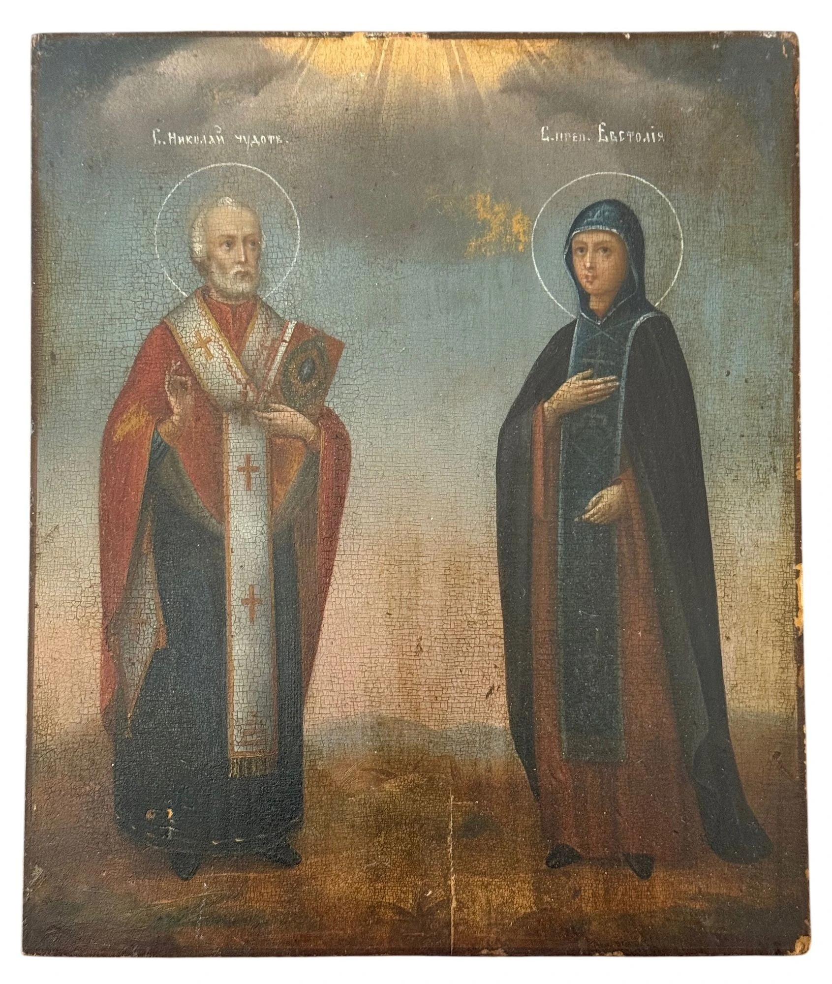 Nineteenth-century Russian icon of Nicholas of Myra at left and Eustolia of Constantinople at right; full paired painting retained.
