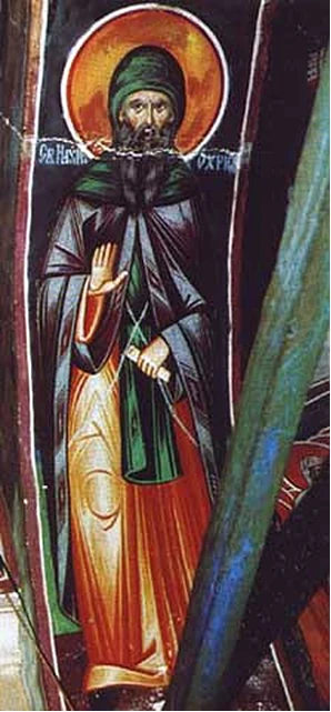 Published photograph of a fresco depicting Naum of Ohrid; a hanging textile obscures part of the painting.